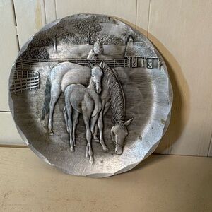 Wendell August hand carved horse coaster.